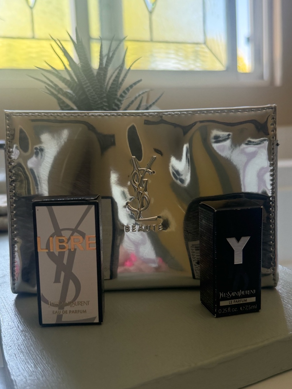 Yves Saint Laurent Silver Cosmetic Case w/Y le parfum  & Libre eau de parfum.